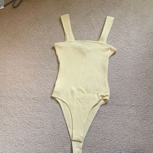 Yellow body suit